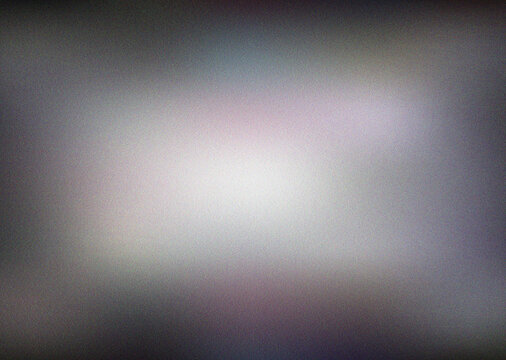 Mysterious dark grey and purple blurred texture with a bright central light creating a moody ethereal ambiance