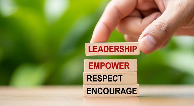 Leadership and empower concept on wooden blocks, business management strategy with respect and encourage text, corporate culture and team building