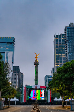Mexico City Icon: Vertical Portrait of the Angel of Independence Monument and Reforma Skyscrapers at Twilight