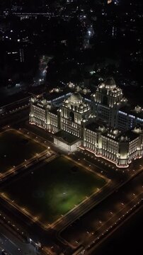 Aerial night & vertical shot of Secretariat of Telangana in Hyderabad, India