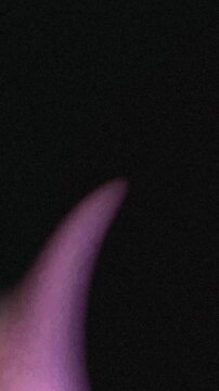 Abstract blurred pink and black shapes.