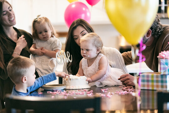 Cousin Steals Frosting From Birthday CCake