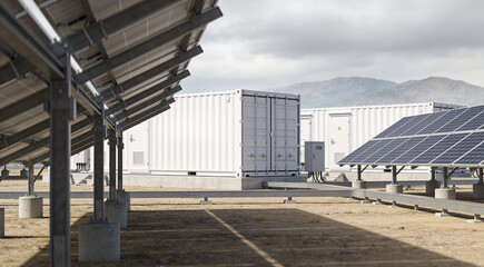 Modern solar energy farm with battery storage containers and photovoltaic panels © Snide12