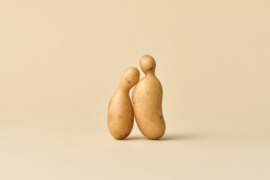Potato couple hugging like two people