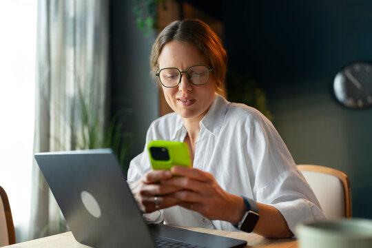 Checking a Smartphone at Home