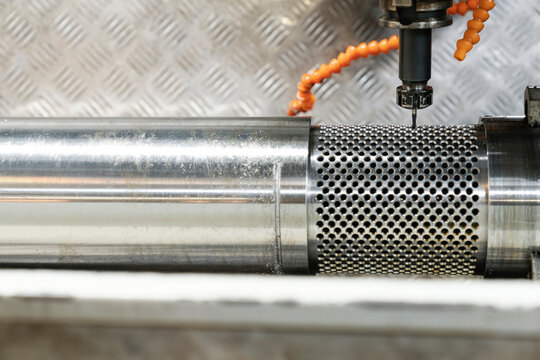 Automated CNC Mill Working on a Metal Roller in a Manufacturing Plant