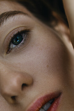 Woman's Close up Portrait with moles on the face 