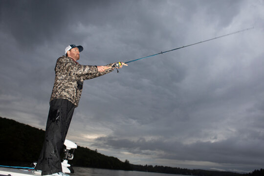Fishing guide cast rod  Lake New Hampshire 