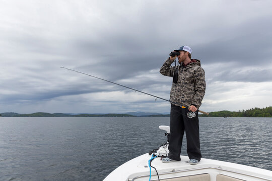 Bow Boat Fisherman Portrait Lake New Hampshire storm 