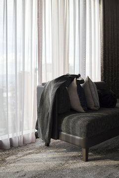 Hotel Room With Natural Light and Soft Furnishings