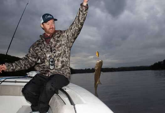 Fishing guide reel in fish Lake 