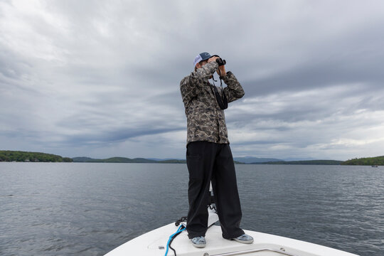 Binoculars  Boat Fisherman Portrait Lake New Hampshire 