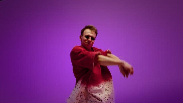 Hip hop dancer performing smooth side to side arm movements
