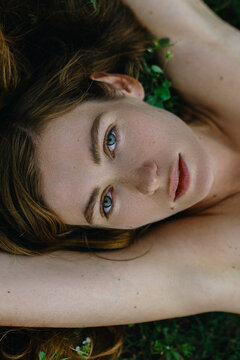 Woman's Close up natural Portrait with moles on the face 