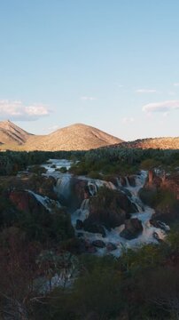 vertical Scenic aerial view of Epupa Falls in Namibia at sunset