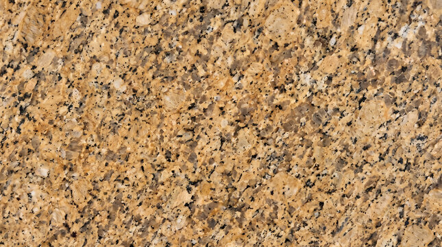 Beige and tan granite stone surface with brown and black mineral speckles natural texture background