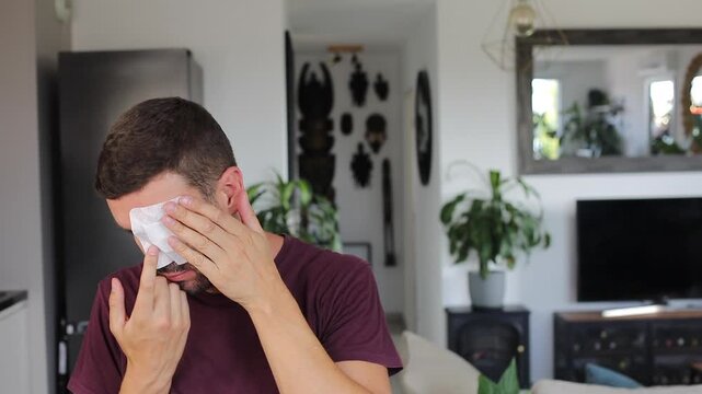Sad man with large patched eye