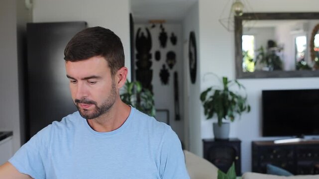 A handsome man looking on the mirror 