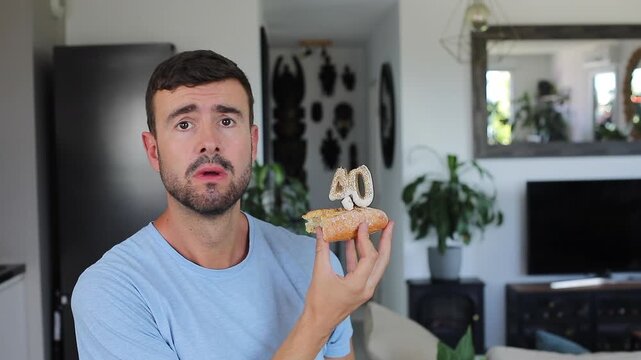 Sad man celebrating his 40th birhtday 