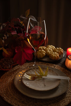 Autumn table setting welcoming Thanksgiving dinner guests