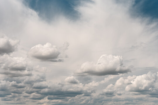 Amazing cirrus and cumulus clouds in the blue sky