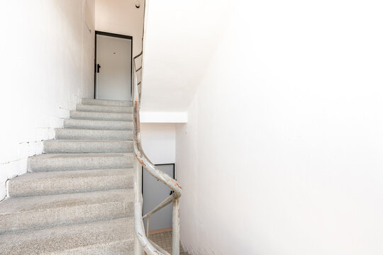 Concrete spiral staircase ascending providing upward movement