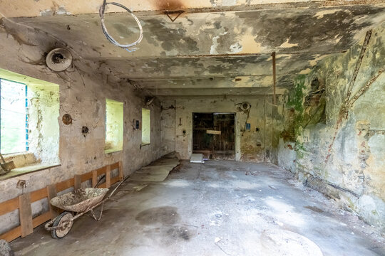 Abandoned rustic old workshop with decaying interior