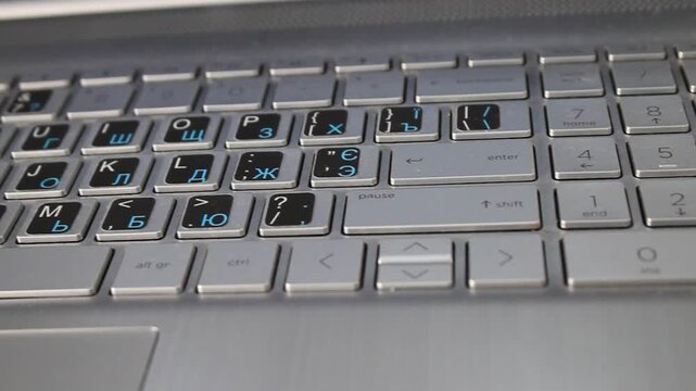 Laptop keyboard with glued letters