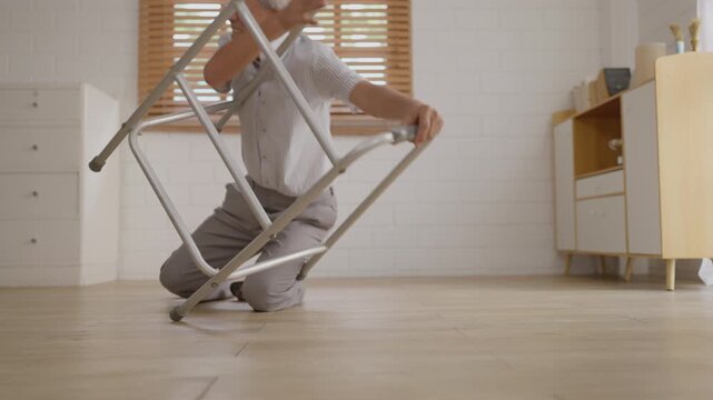 Health insurance with caregiver at home Nurse elder fall care home injury patient caregiver medical emergency walker mobility support adult on floor after accident near furniture indoor light