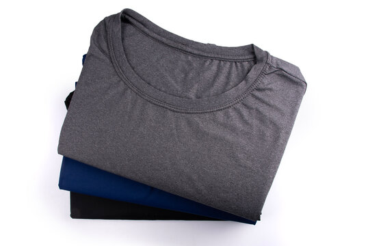Editable T-shirt logo mockup: set of 3 folded T-shirts, top view.