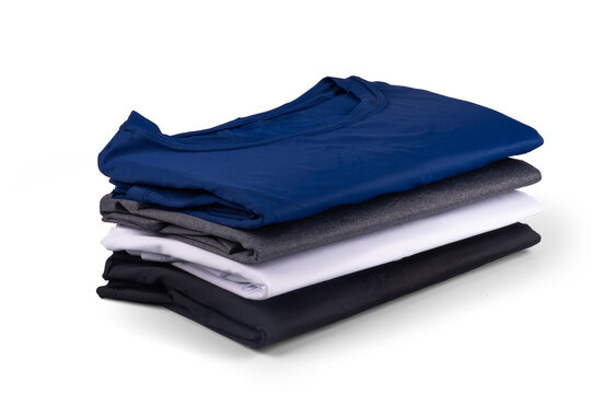 Set of 4 basic sports polyamide t-shirts, stacked and folded, isolated