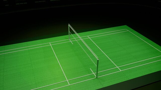 Panning camera moving forward over raised green court, revealing center net posts under lights