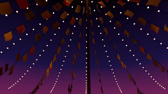 Tilting camera showing radial canopy around central pole in field, with bulbs and fluttering flags