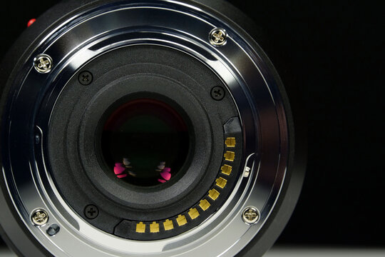 Close-up of Micro Four Thirds M43 lens mount for macro photography on black