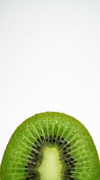 Vibrant fresh half kiwi fruit slice isolated on a clean white background for healthy eating concepts and refreshing culinary ingredient presentation