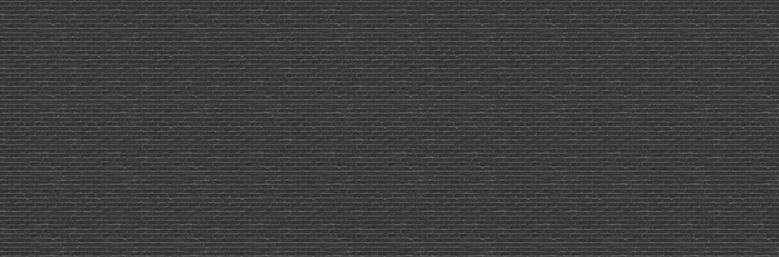 Wide dark charcoal brick wall texture, horizontal banner background with rustic black masonry block facade