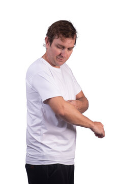 Male model wearing glasses and a white UV-protective polyamide sports shirt, adjusting the short sleeve.