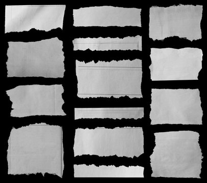 Torn papers on black