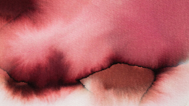 Exploring watercolor abstractions with rich colors and flowing shapes in an artistic setting