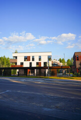 Modern contemporary apartment building with secure gated under croft parking. Business-class monolithic house with flats. City apartment in gated community. Suburb apartments in city City suburbs home © MaxSafaniuk