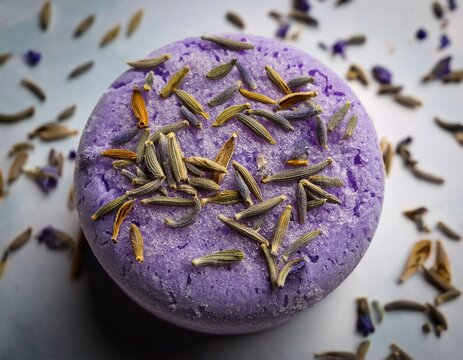 round lavender bath tablet with dried botanical particles