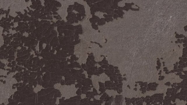 4k horizontal slow motion footage of antique dark brown leather texture with lots of worn areas, cracks, scratches and other rough features