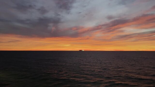 early morning at sea. ship at anchorage.