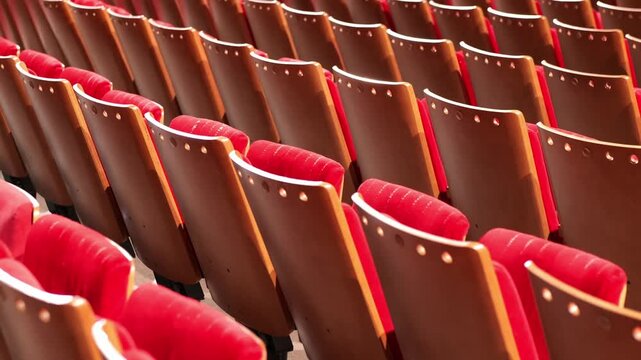 Empty Red Auditorium Seats in Rows at Conference Hall
