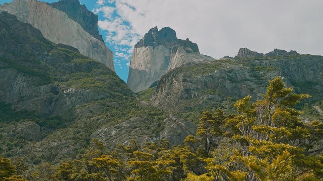 Sunny day with a view of the granite mountain peaks in Torres del Paine with Parallax movement, Patagonia, Chile