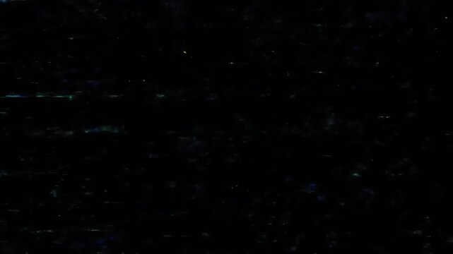 Abstract dark background with faint blue-green highlights and blurred textures
