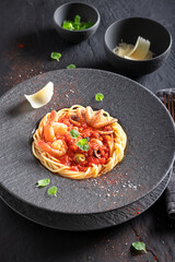 Fototapeta premium Professional and fresh spaghetti bolognese with octopus and shrimps.