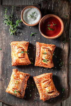 Tasty sausage in puff pastry as a snack for breakfast.