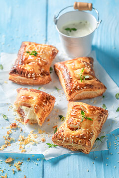 Hot and homemade sausage roll with thyme and sesame seeds.