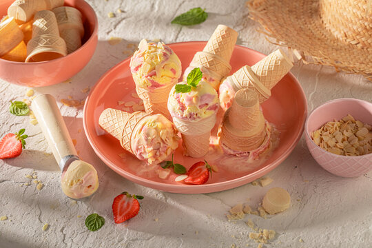 Cold and homemade strawberry ice cream as a summer dessert.